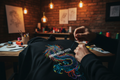Custom embroidery work on a premium hoodie in an urban workshop setting